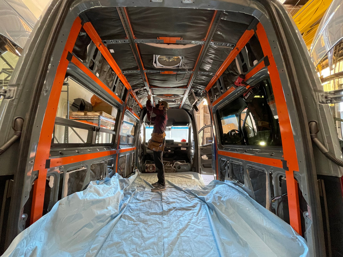 Person in process of converting the interior of their sprinter van