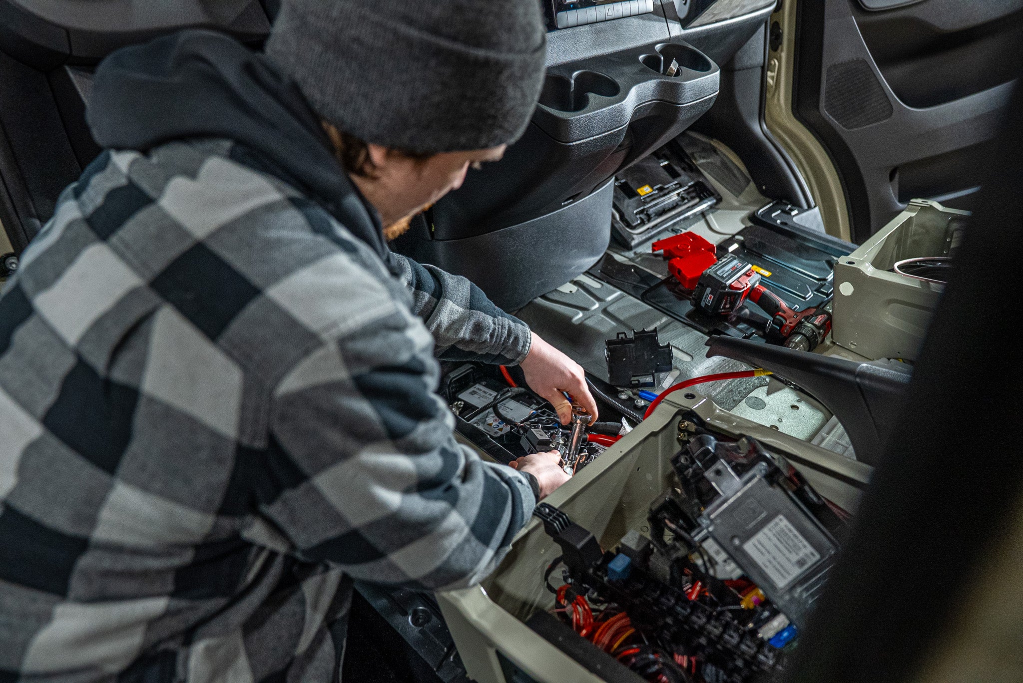Adventure Wagon Install Team Working On Electrical