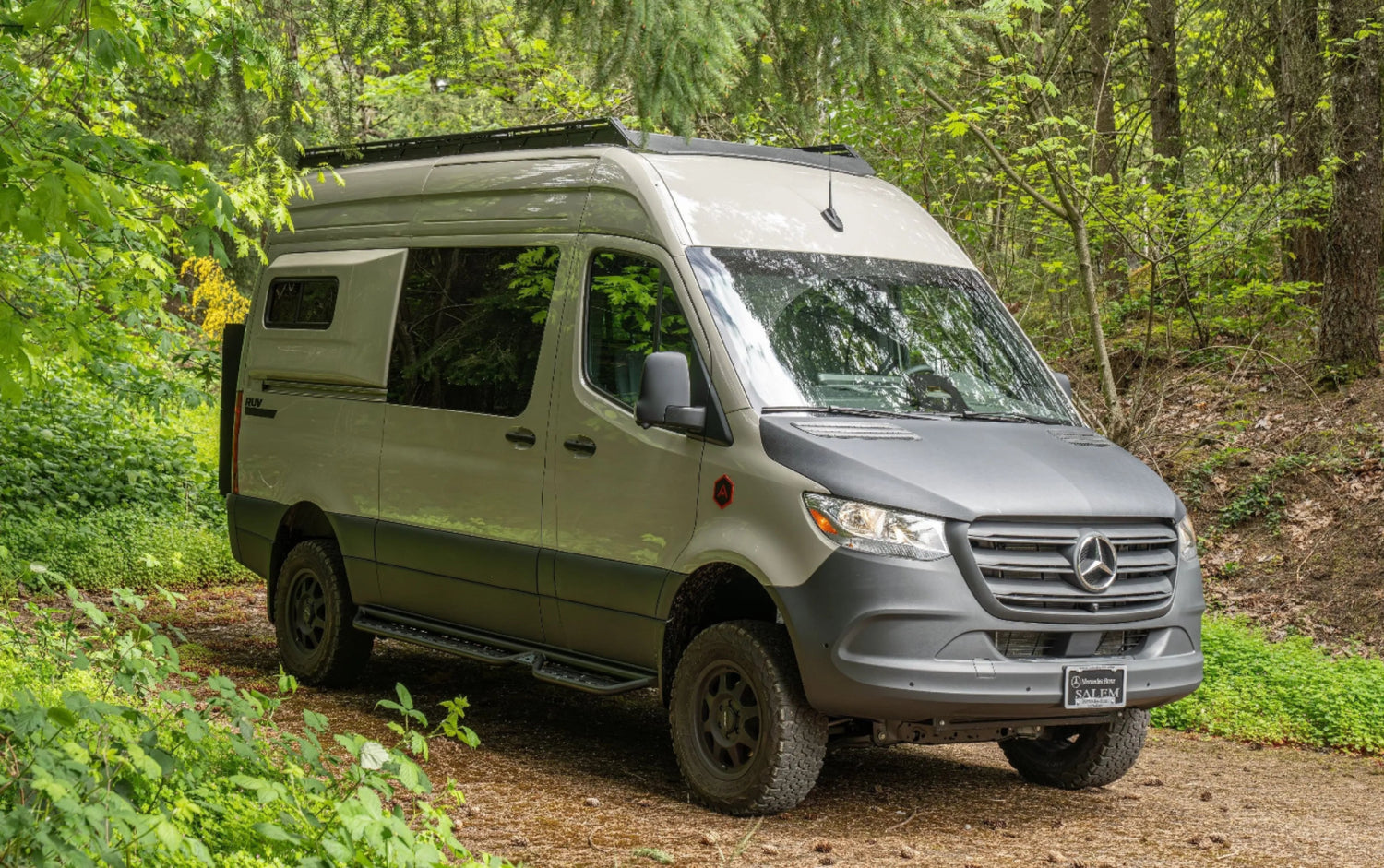 Exterior of Adventure Wagon RUV 538 Turn-Key Van in Forest