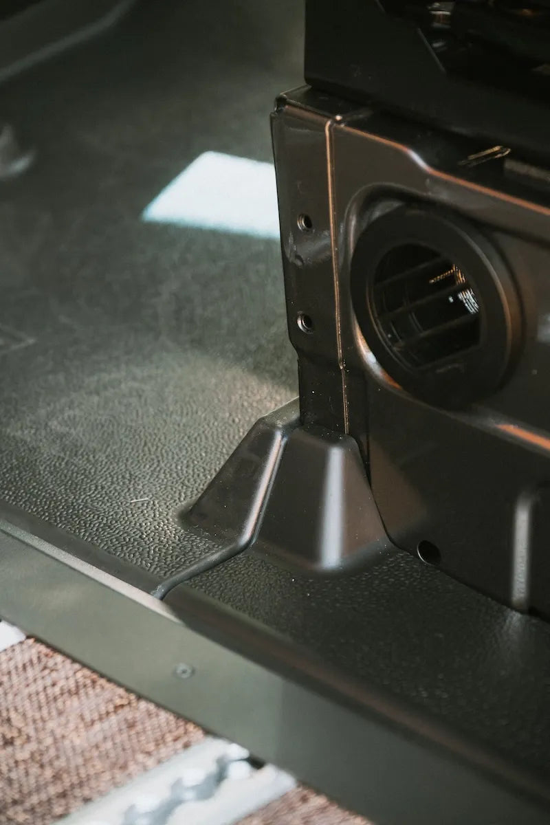 Espar heater installed inside an Adventure Wagon camper van to provide compact, integrated heating for cold-weather and four-season travel.