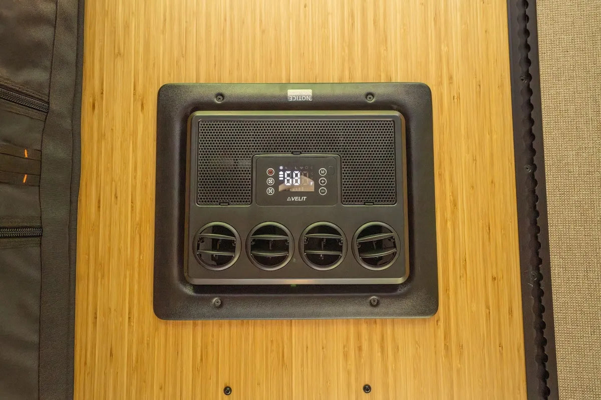 Adventure Wagon RUV camper van heater control installed in the finished interior wall for all-season van heating and climate comfort.