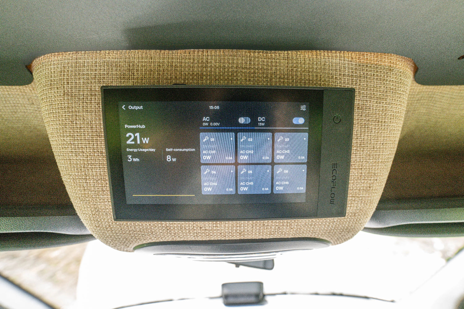 Adventure Wagon Guided Build 538 control display mounted above the cab in a Mercedes Sprinter camper van.