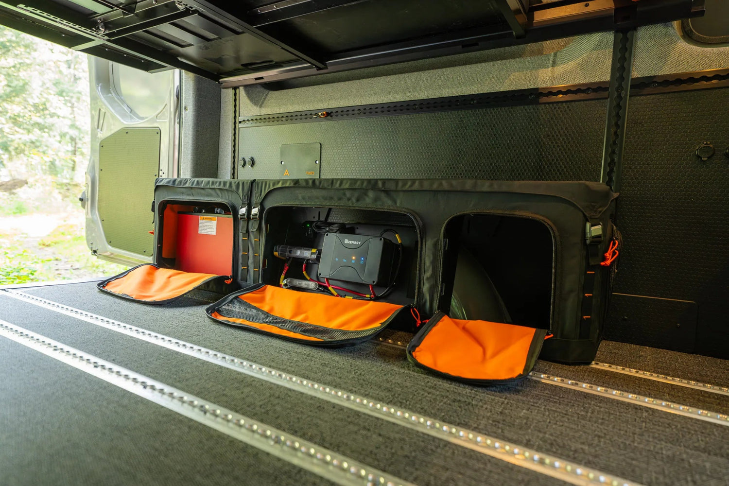 Adventure Wagon Guided Build 715 GOAT Locker electrical system and organized storage mounted beneath the bed platform.