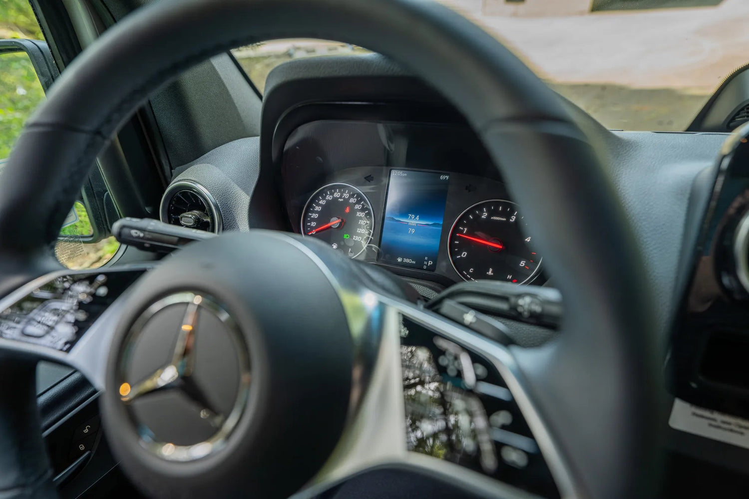 Adventure Wagon Guided Build 715 Mercedes Sprinter dashboard and steering wheel detail from the driver seat.