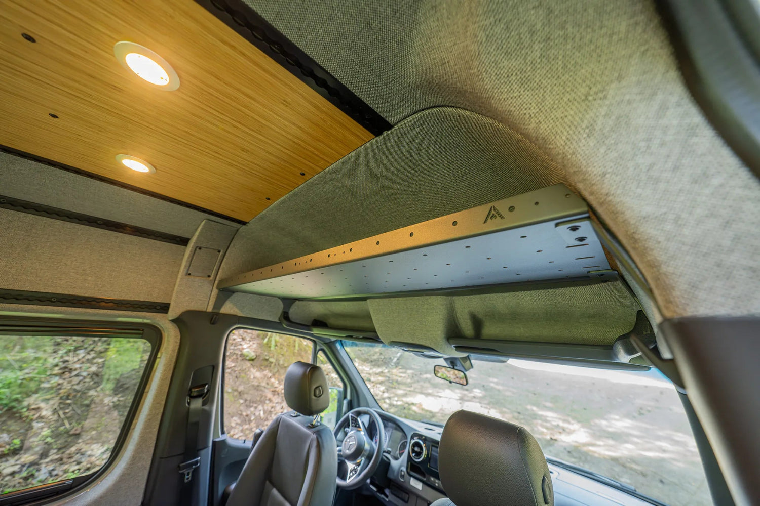 Adventure Wagon Guided Build 715 overhead cab shelf detail above the driver and passenger seats.